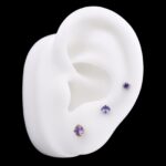 Labret Circón Morado (16G) – Titanio G.I. – Piercing Colombia