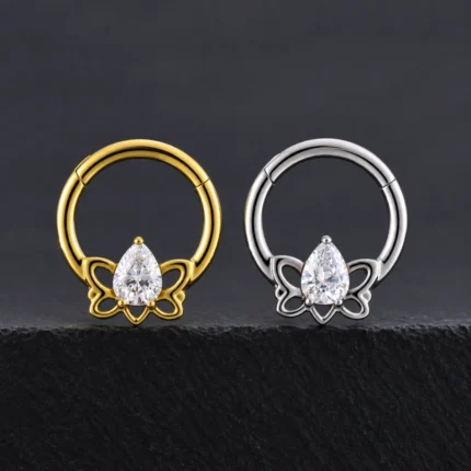 Aro clicker Janet Van Dyne de 8 mm con mariposa calada y circón gota en dorado y plateado