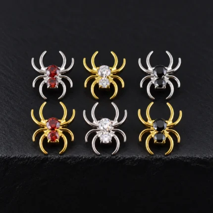Tops de piercing en forma de araña en titanio plateado y dorado con circones rojos, blancos y negros