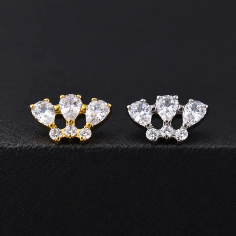 Top Indiana con tres circones gota y tres redondos blancos en dorado y plateado