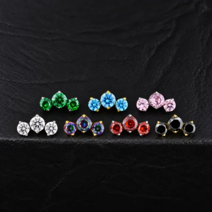 Tops de titanio con tres circones redondos en arco en verde, azul, rosa, blanco, tornasol, rojo y negro