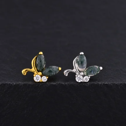 Tops de titanio dorado y plateado en forma de mariposa con ágata musgo y circones