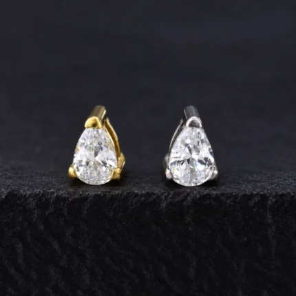 Top Taurus de titanio con circón blanco en gota en dorado y plateado