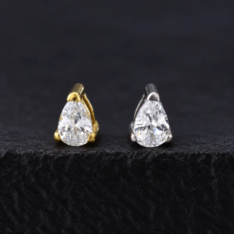 Top Taurus de titanio con circón blanco en gota en dorado y plateado