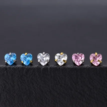 Tops de titanio con circón corazón azul, blanco y rosado, garras plateadas y doradas