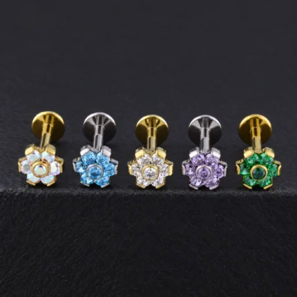 Labret Dalhia con flor de circones en tornasol, azul, blanco, lila y verde, en dorado y plateado